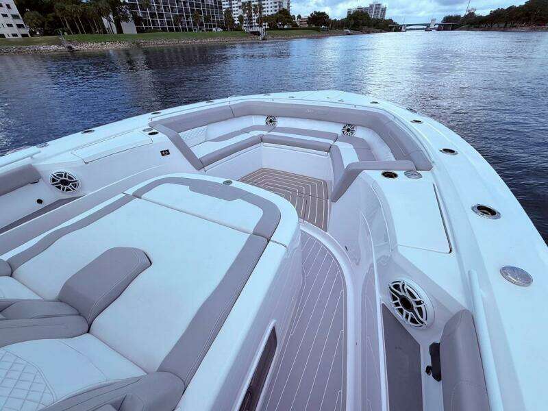 2024 Scout 400 LXF boat interior with luxurious seating and waterfront view.