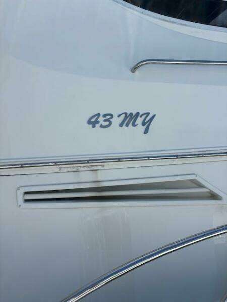 2006 Carver 43 Motor Yacht exterior detail with "43 MY" lettering.