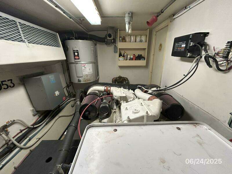 63' Hatteras starboard engine room aft