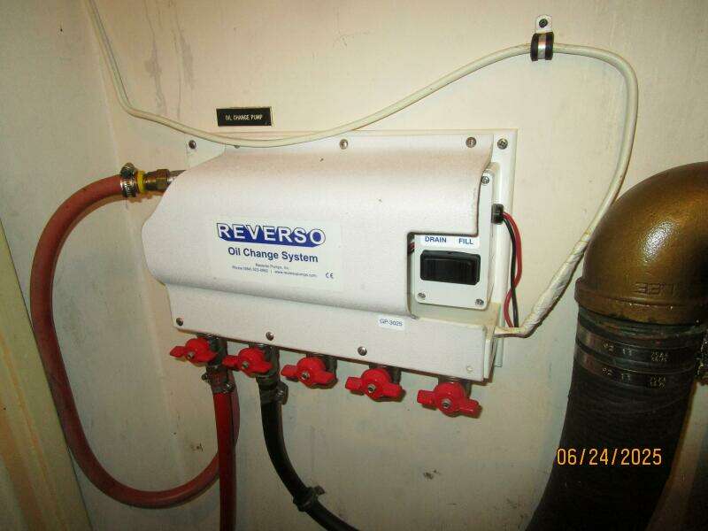 63' Hatteras port engine room oil change system