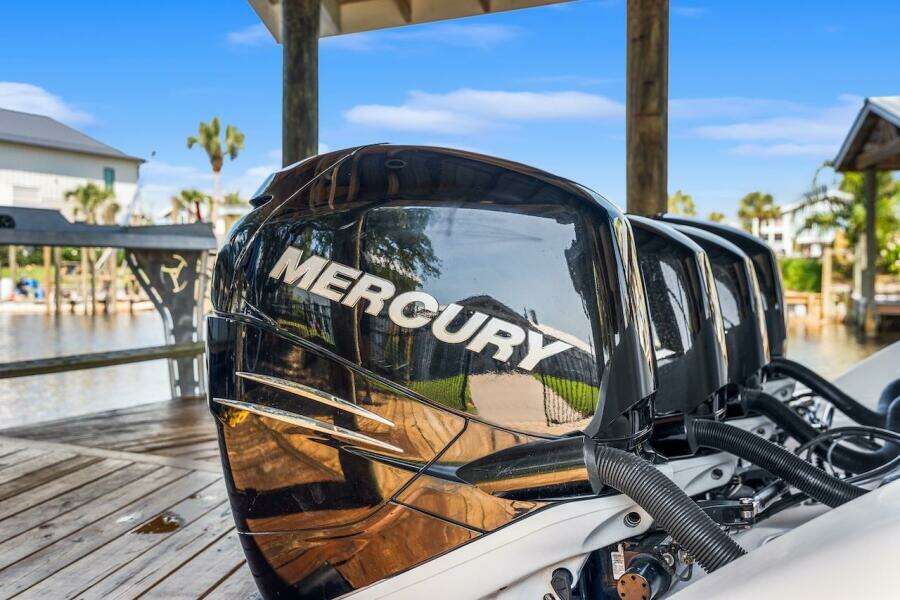 2015 Yellowfin 39 boat with Mercury outboard engines at a dock.