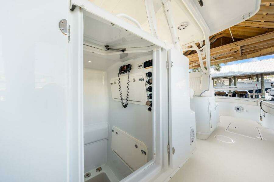 2015 Yellowfin 39 boat interior with control panel and seating area.
