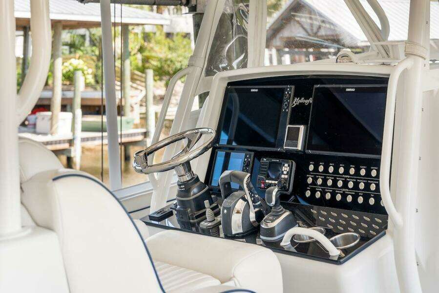 2015 Yellowfin 39 boat helm with dual screens and control panel.