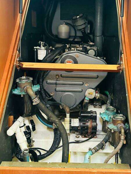 Engine compartment of a 2015 Beneteau Oceanis 45 sailboat, showcasing mechanical components.