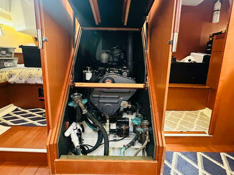 Engine compartment of 2015 Beneteau Oceanis 45 sailboat, showcasing mechanical components.