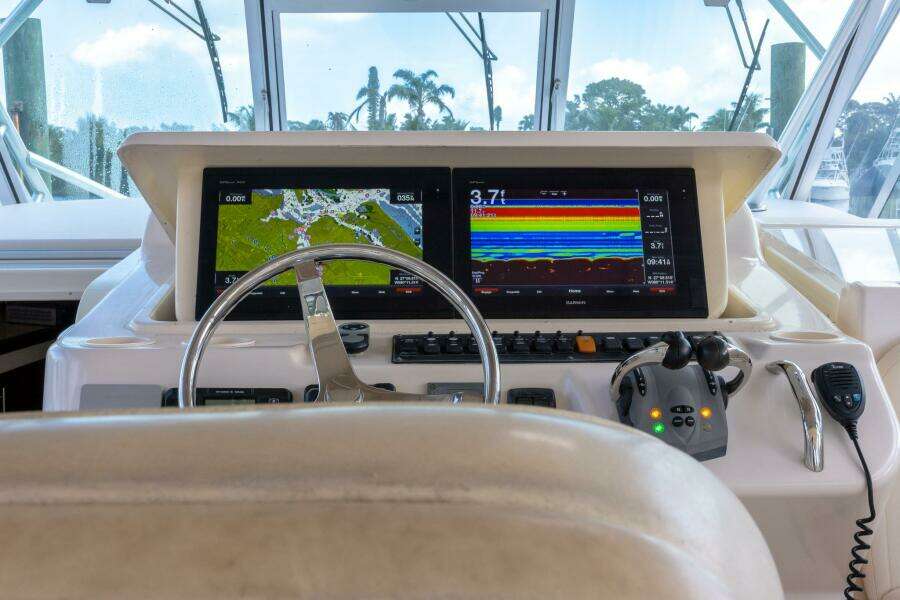 Helm of 2007 Grady-White Express 360 with dual navigation screens and controls.