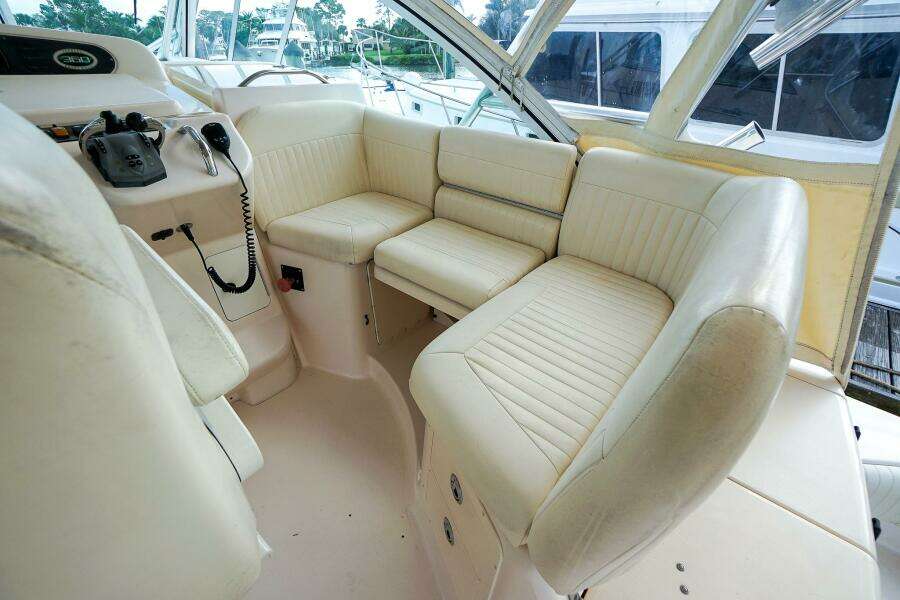 2007 Grady-White Express 360 boat interior with cream leather seating and helm controls.