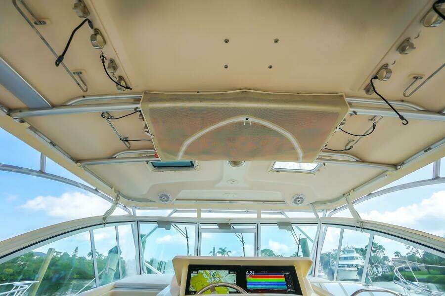 2007 Grady-White Express 360 boat interior with navigation system and panoramic windows.
