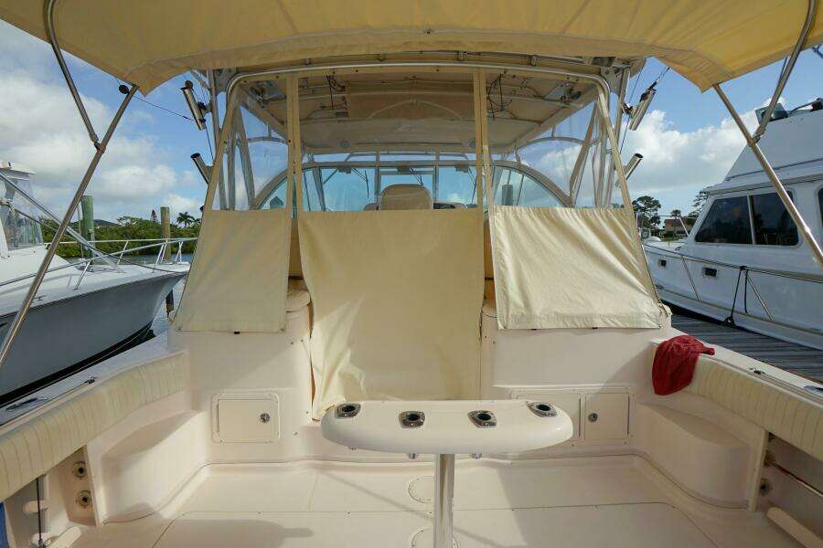 2007 Grady-White Express 360 boat interior with seating and rod holders.