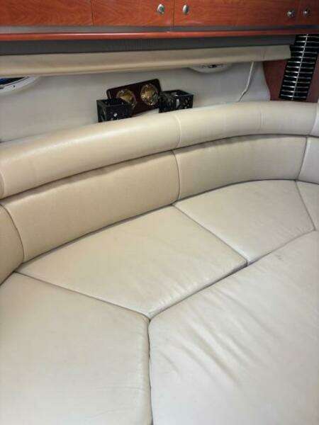 Interior seating of 2007 Monterey 350 Sport Yacht with beige leather upholstery.