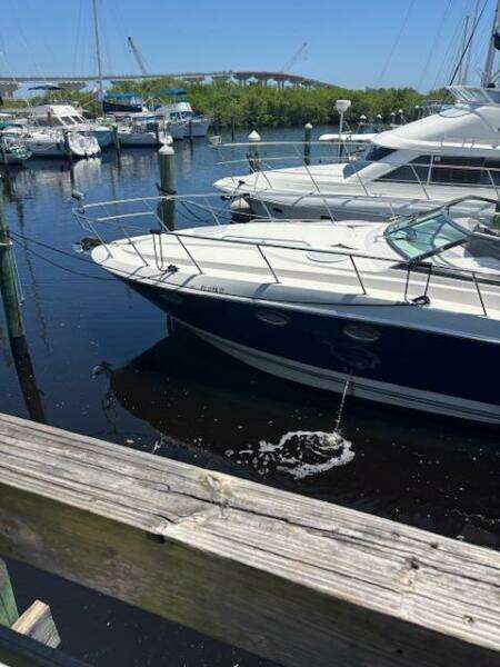 2007 Monterey 350 Sport Yacht docked in a marina with other boats.