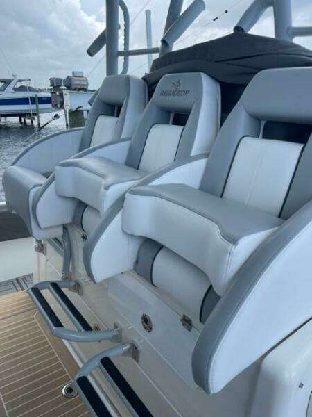 Luxury seating on a 2018 Regulator 41 boat, featuring sleek design and comfort.