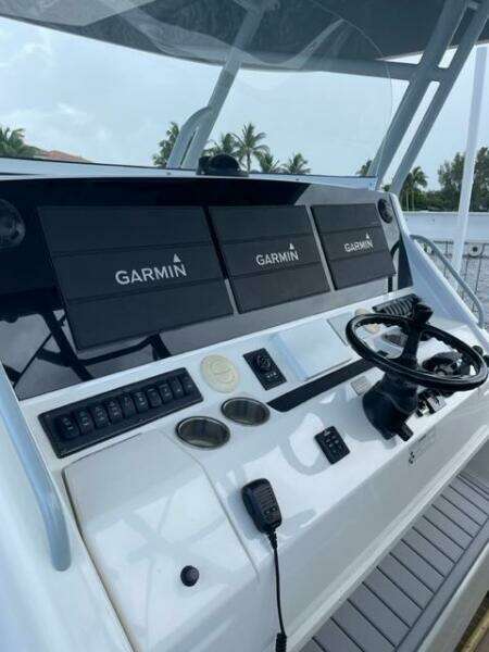 2018 Regulator 41 boat helm with Garmin navigation displays and controls.