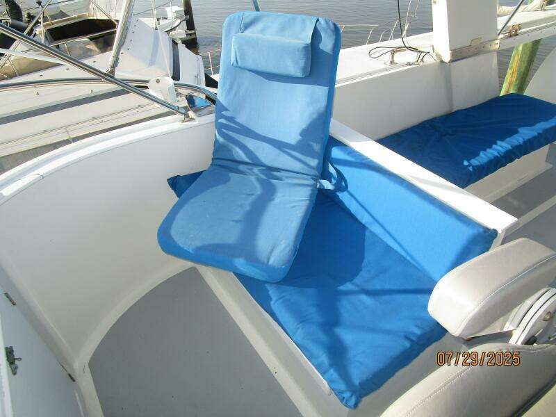 44' DeFever flybridge starboard forward seating
