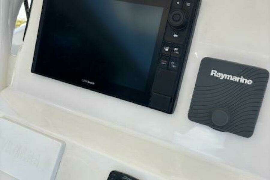 Century 2600 Center Console 2018 boat dashboard with Raymarine navigation system.