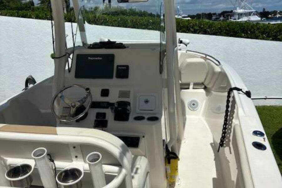 2018 Century 2600 Center Console boat with modern dashboard and spacious deck.