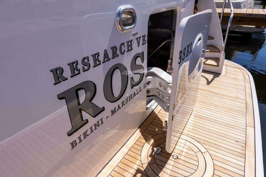 Research vessel docked, featuring "ROS" and "Bikini - Marshall Islands" on the hull.