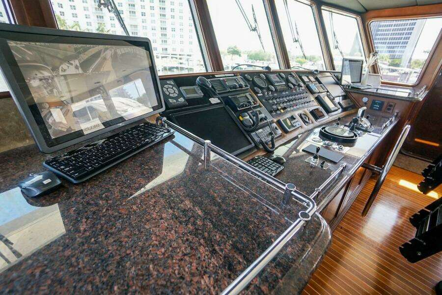 Bridge control panel of 1996 ABD 90 Explorer yacht with navigation instruments.