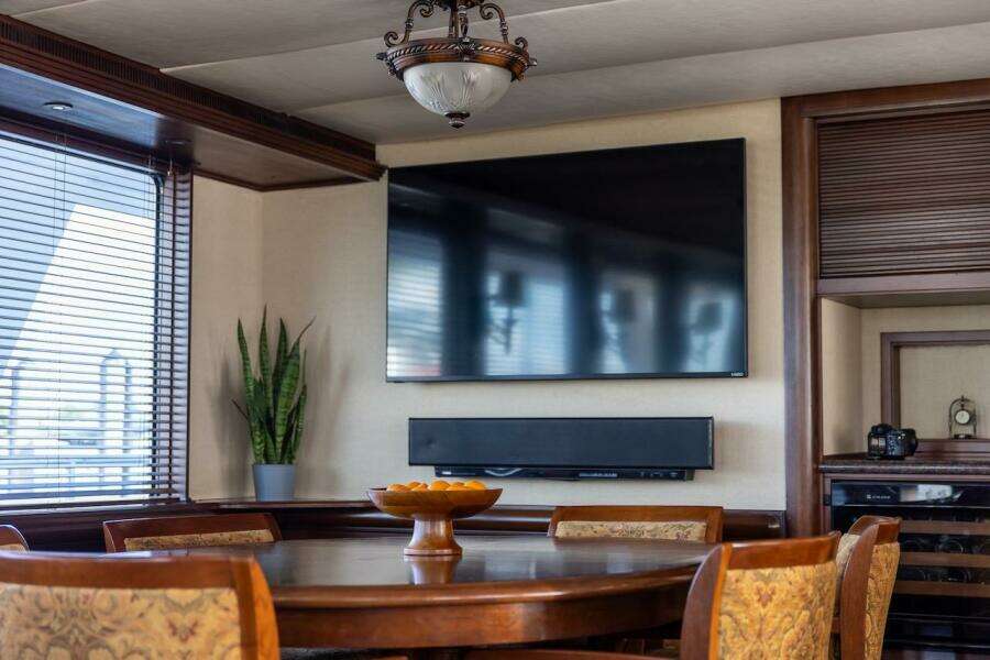 Luxurious leather seating area with lamp, inside 1996 ABD 90 Explorer yacht.