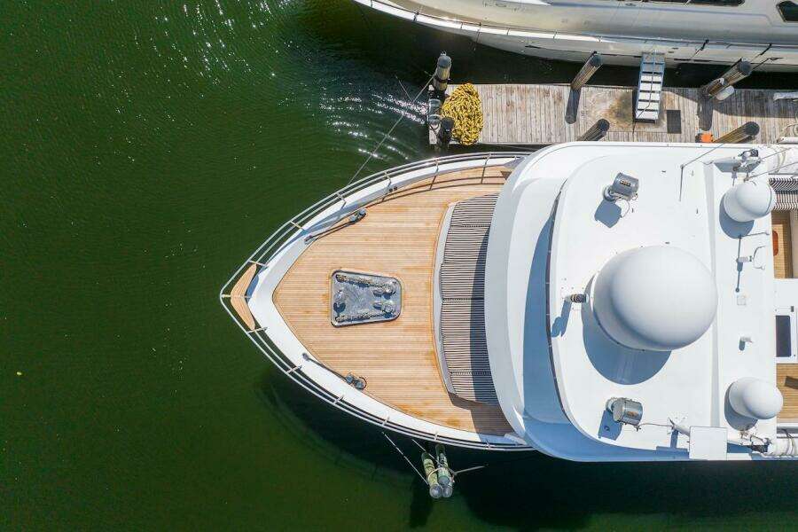 Aerial view of 1996 ABD 90 Explorer yacht docked at marina.