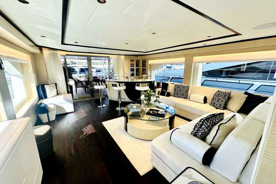 Luxurious interior of 2023 Majesty 120 yacht with elegant seating and modern decor.