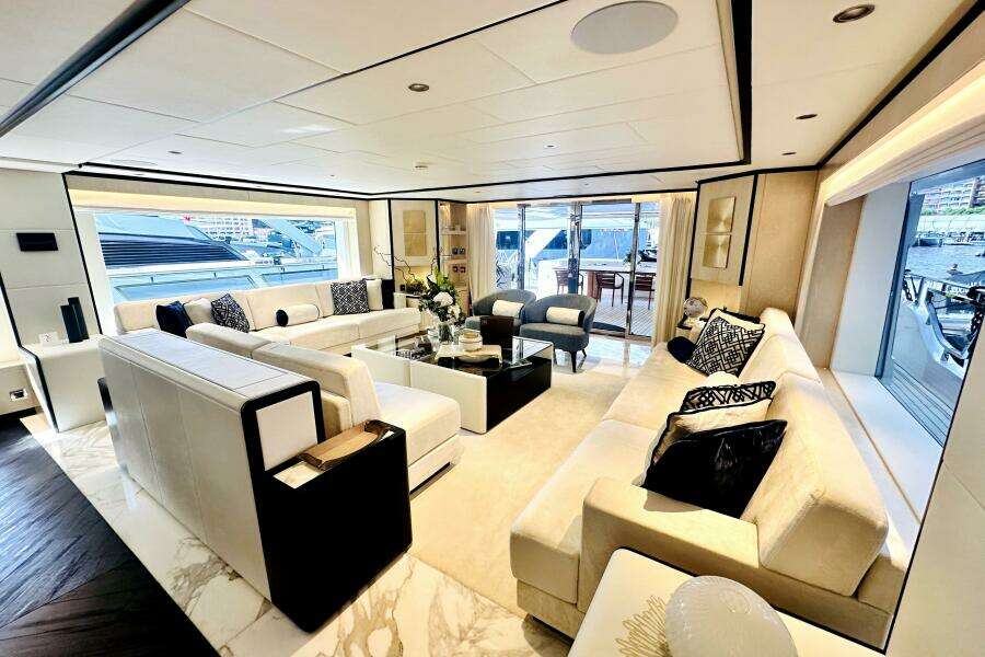 Luxurious interior of 2023 Majesty 120 yacht with elegant seating and modern decor.