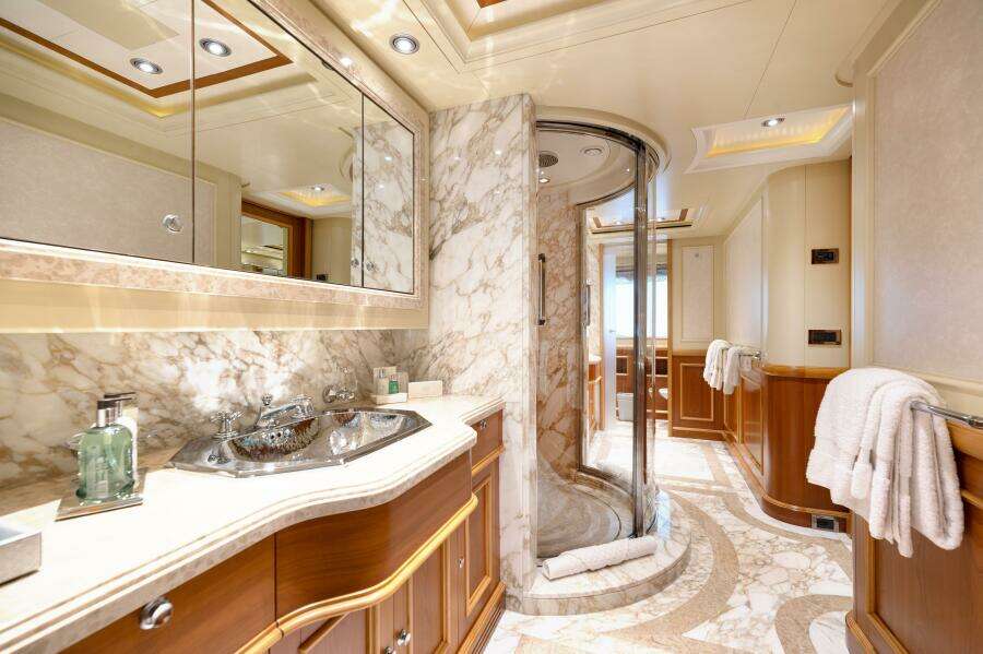 Master Ensuite with His and Her Sinks and Private WCs