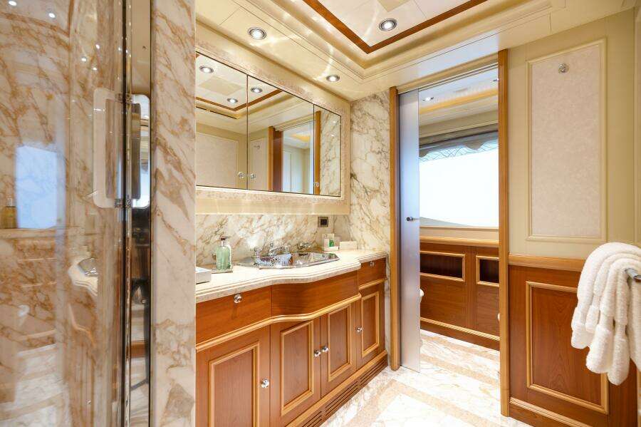 Master Ensuite with His and Her Sinks and Private WCs