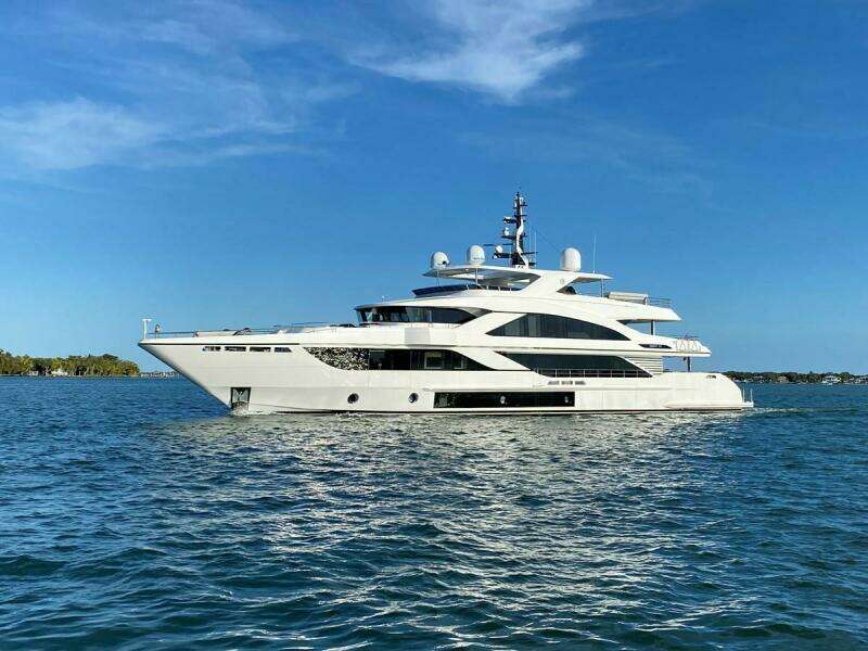 Luxurious 2020 Majesty 140 yacht cruising on a sunny day.
