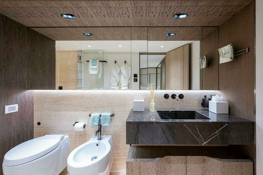 Luxurious 2020 Majesty 140 yacht bathroom with modern fixtures and elegant design.