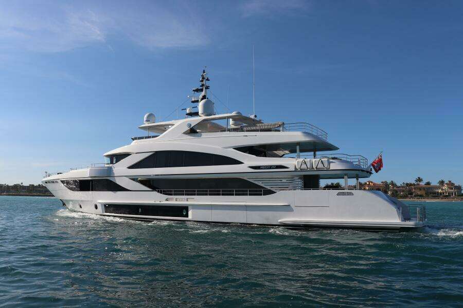 Luxurious 2020 Majesty 140 yacht cruising on clear blue waters.