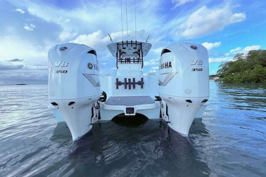 2019 Freeman 34 boat with twin Yamaha V8 350 engines on water.