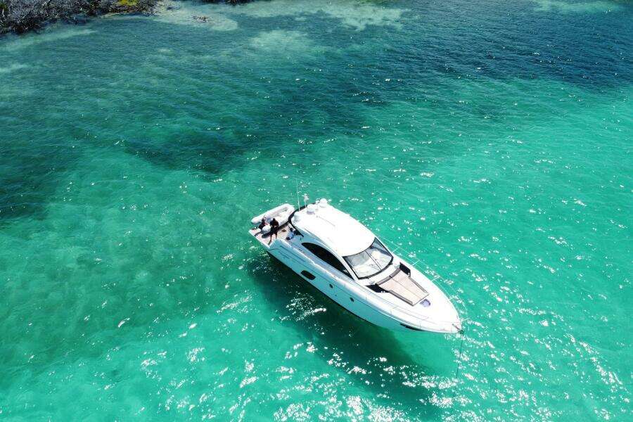 Beneteau Gran Turismo 44 yacht cruising in clear turquoise waters, 2014 model.