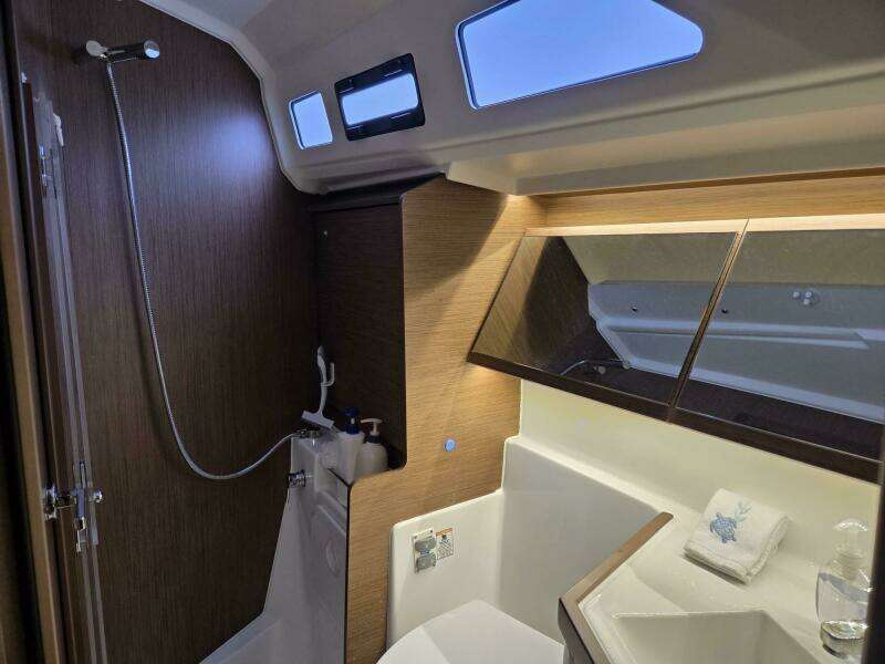 Head w/ Sink, Toilet, Shower Stall