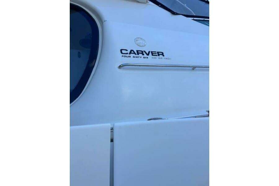 2004 Carver 466 Motor Yacht side view with logo detail.