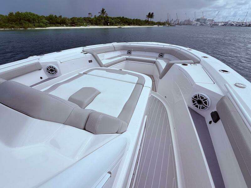 2024 Scout 400 LXF boat interior with luxurious seating and ocean view.