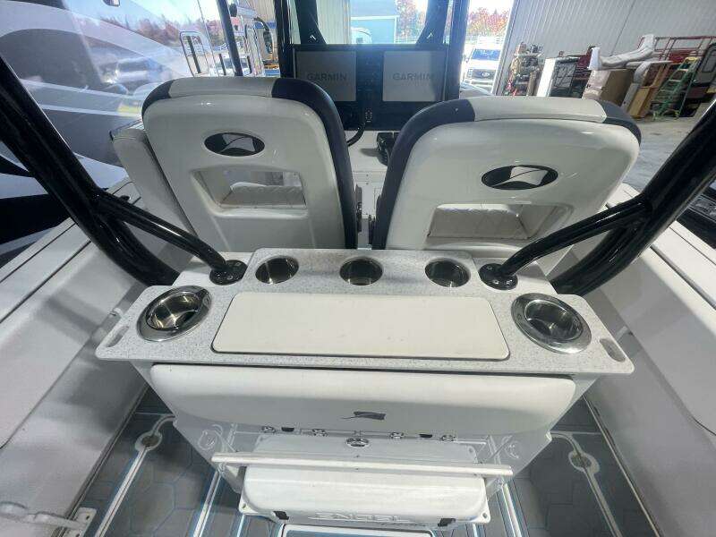 Leaning Post with Cup Holders and Rod Storage on Center Console