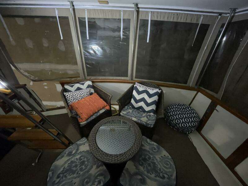 Aft Deck Seating Area with Wicker Chairs – Egg Harbor 40 Motor Yacht