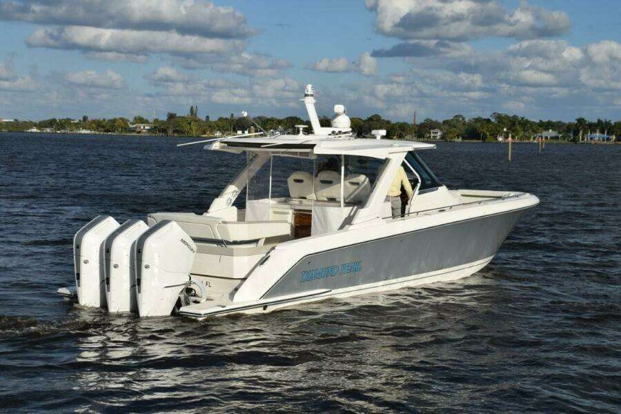Easy To Get Around The Boat With Integral Handrails Forward. Dive Ladder Clips On Platform Starboard Side Aft